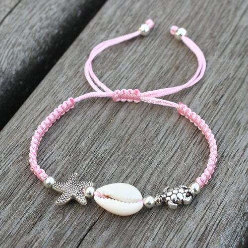 Pulseira estilo praia, cores que combina com o seu biquíni. Cor da Pulseira Rosa