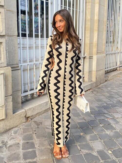Descubra a dualidade elegante no Vestido Catarina Longo Branco e Preto da Nobrelo. Este vestido exibe um equilíbrio perfeito entre o branco e o preto, proporcionando uma aparência única e sofisticada.
