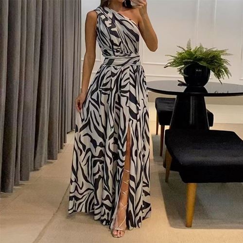 Descubra o glamour da moda com o Vestido Longo Sem Manga Kellen da Nobrelo. Esta peça exclusiva é uma expressão de elegância refinada, projetada para mulheres que desejam destacar-se com um visual sofisticado.